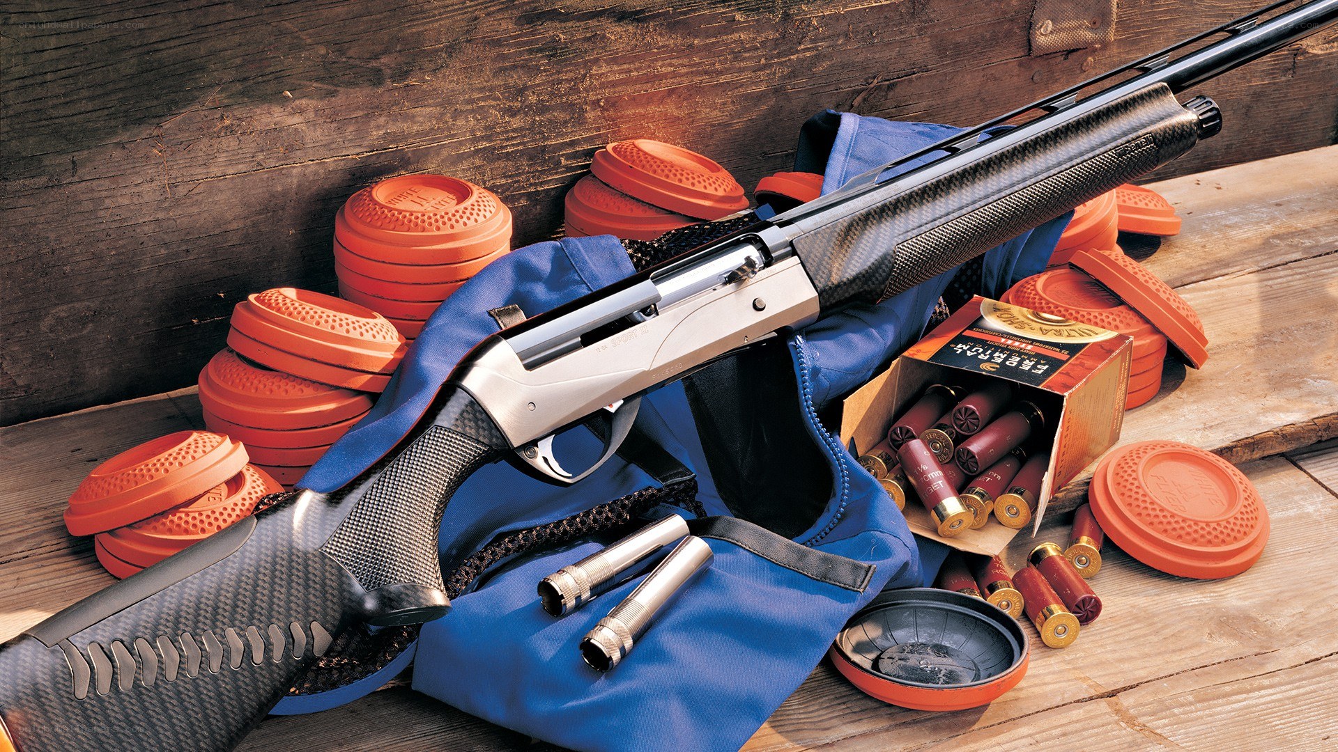 shotgun with ammunition and targets