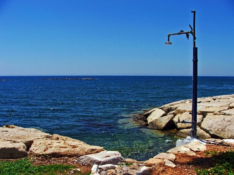 Shower on Rocky Shore