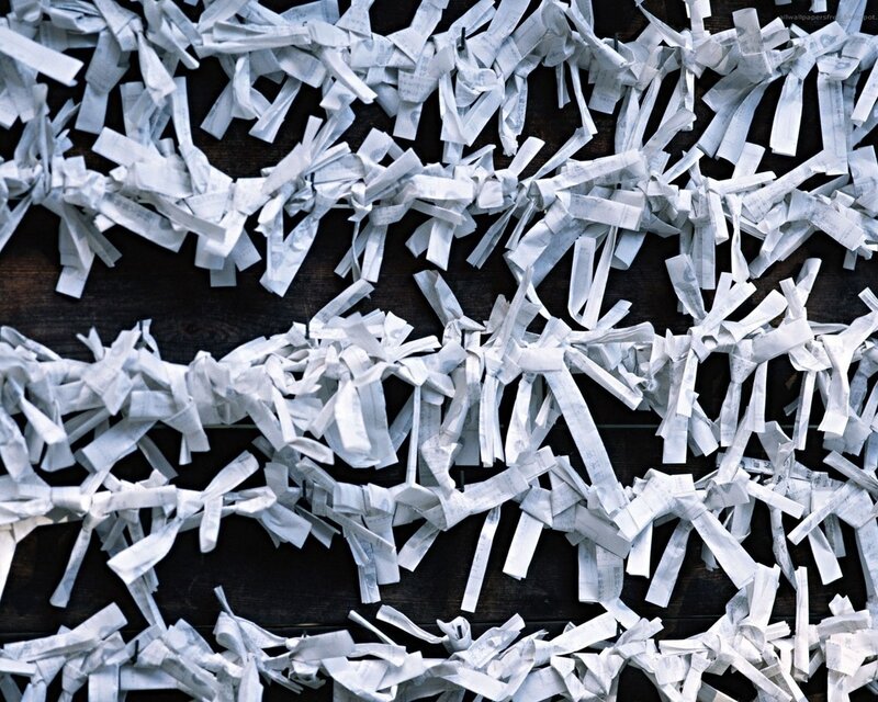 Shredded paper strips on wood