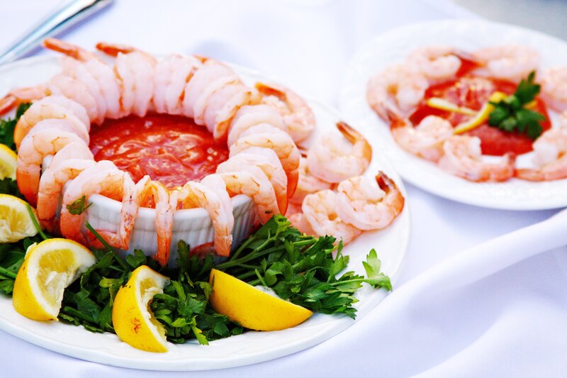 Shrimp cocktail with lemon and parsley