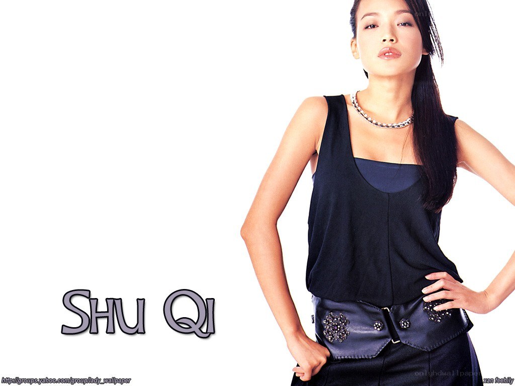 Shu Qi in a black top