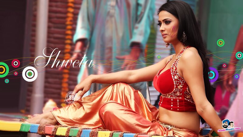 Shweta in red and gold attire