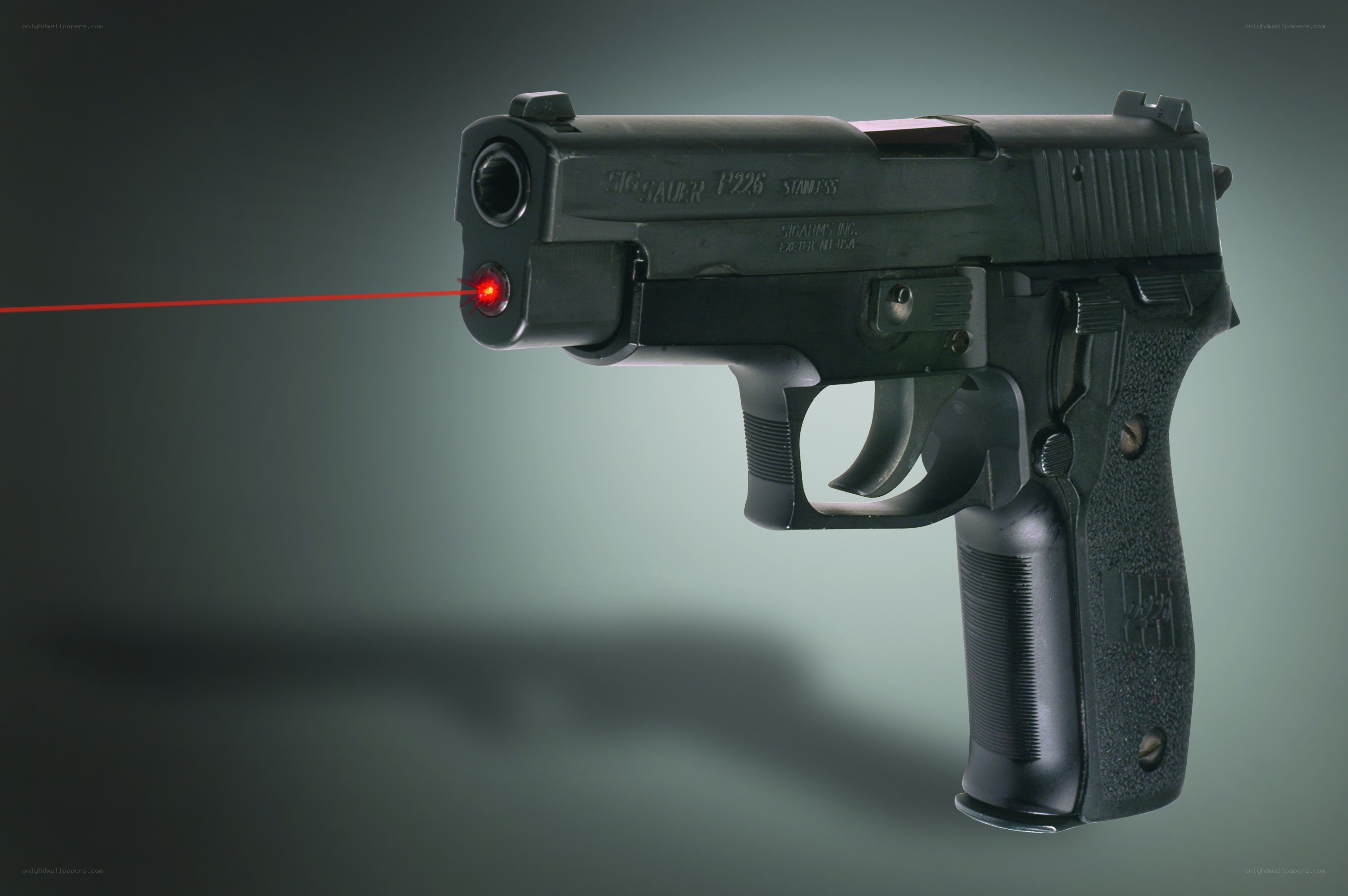 Sig Sauer P226 pistol with laser