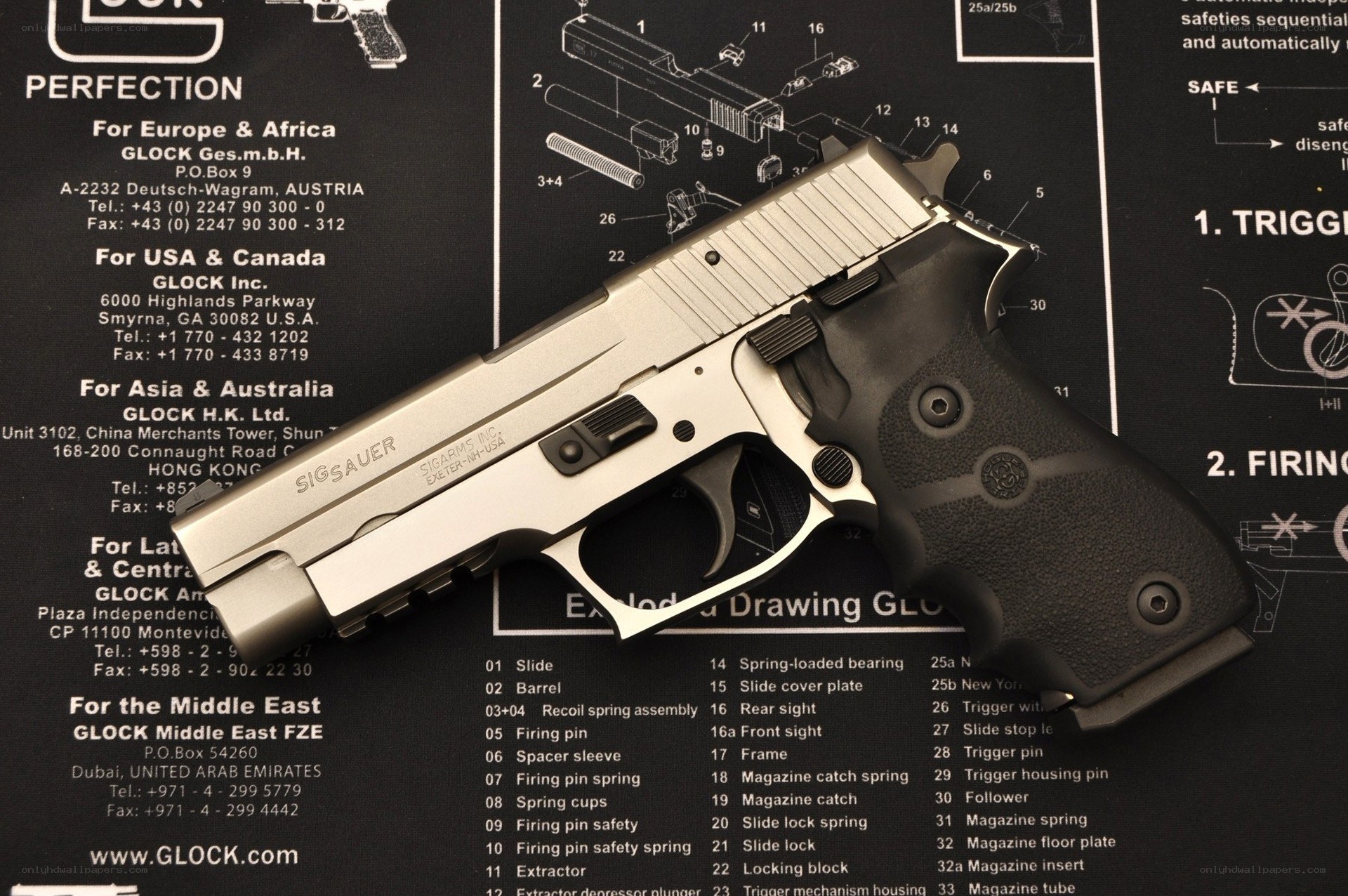 SIG Sauer pistol on manual