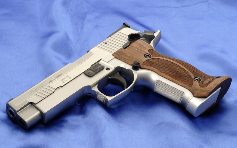 Sig Sauer pistol with wooden grips