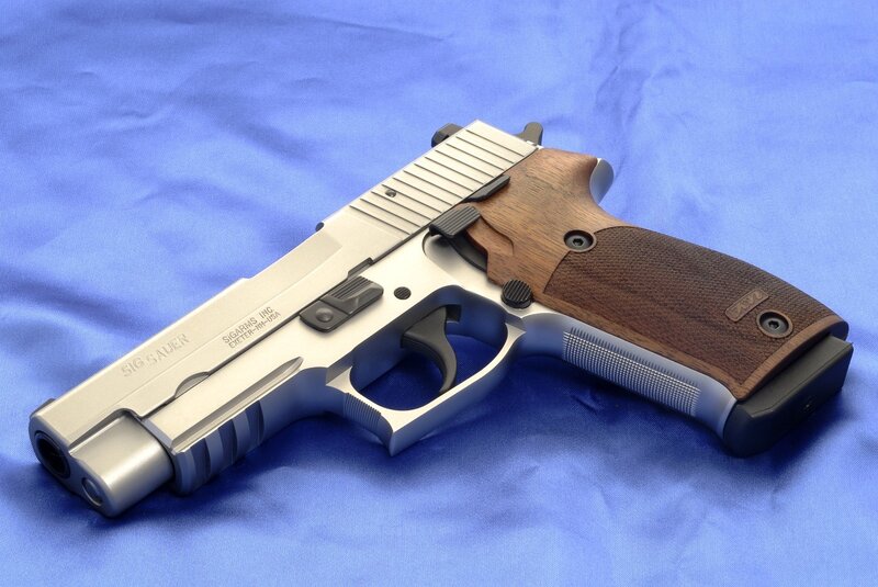 Sig Sauer pistol with wooden grips