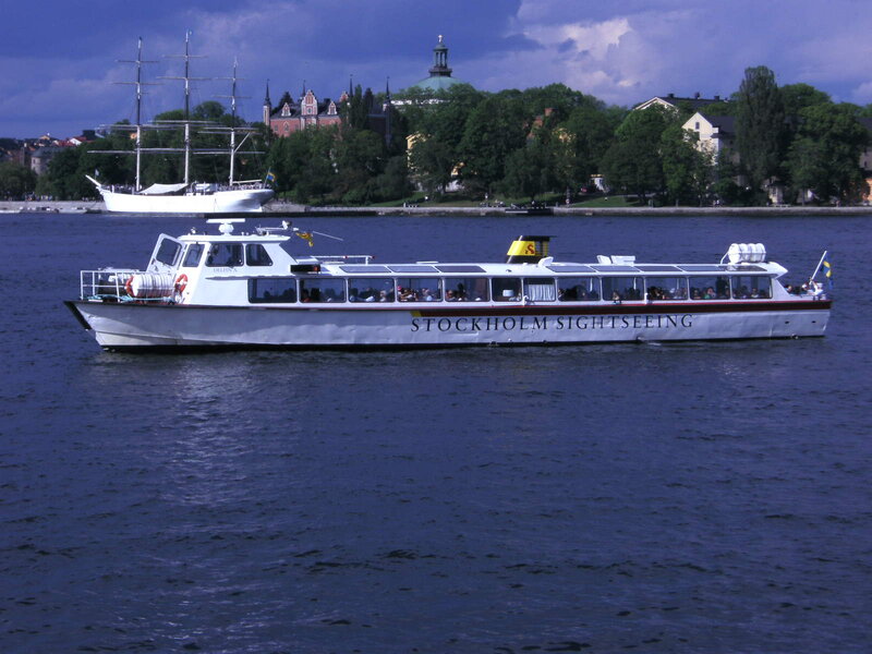 Sightseeing Boat on Water — Blue