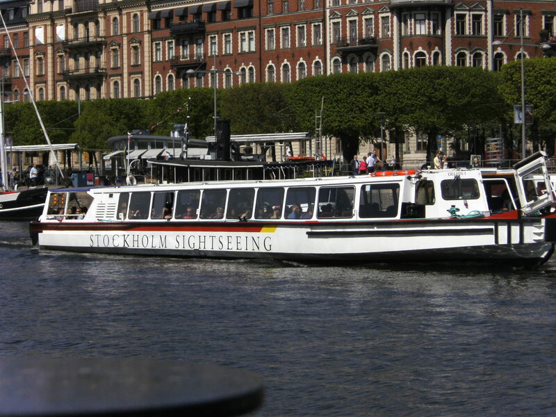 Sightseeing Boat on Water — White