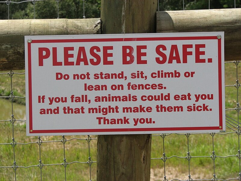 Sign on a Fence