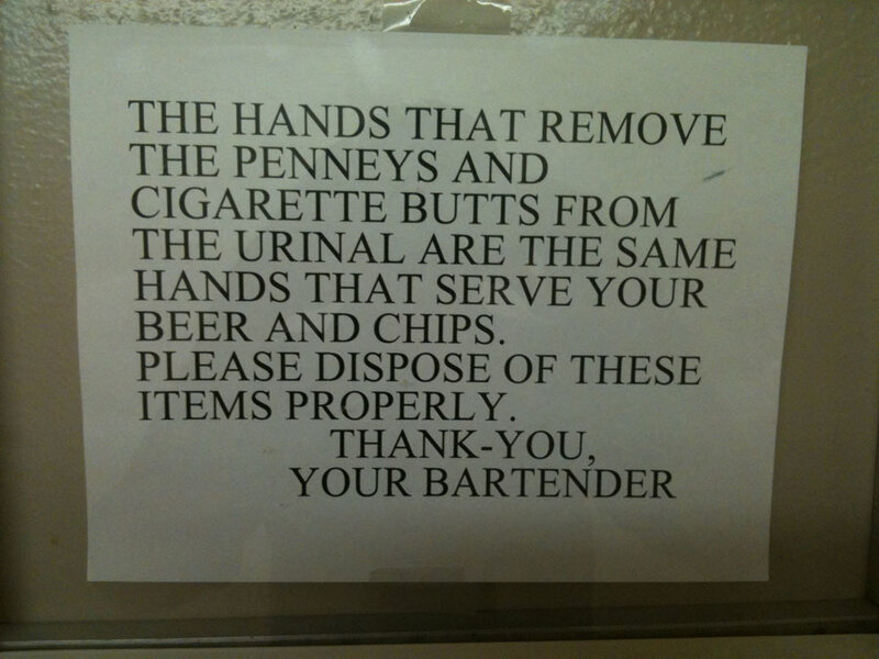 Sign on a Wall — White, Informative