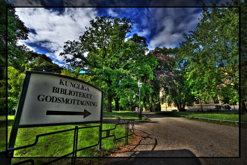 Sign Pointing to Library