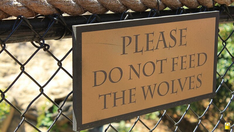 Sign warning not to feed wolves