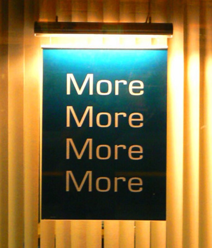 Sign with repeated 'More' text