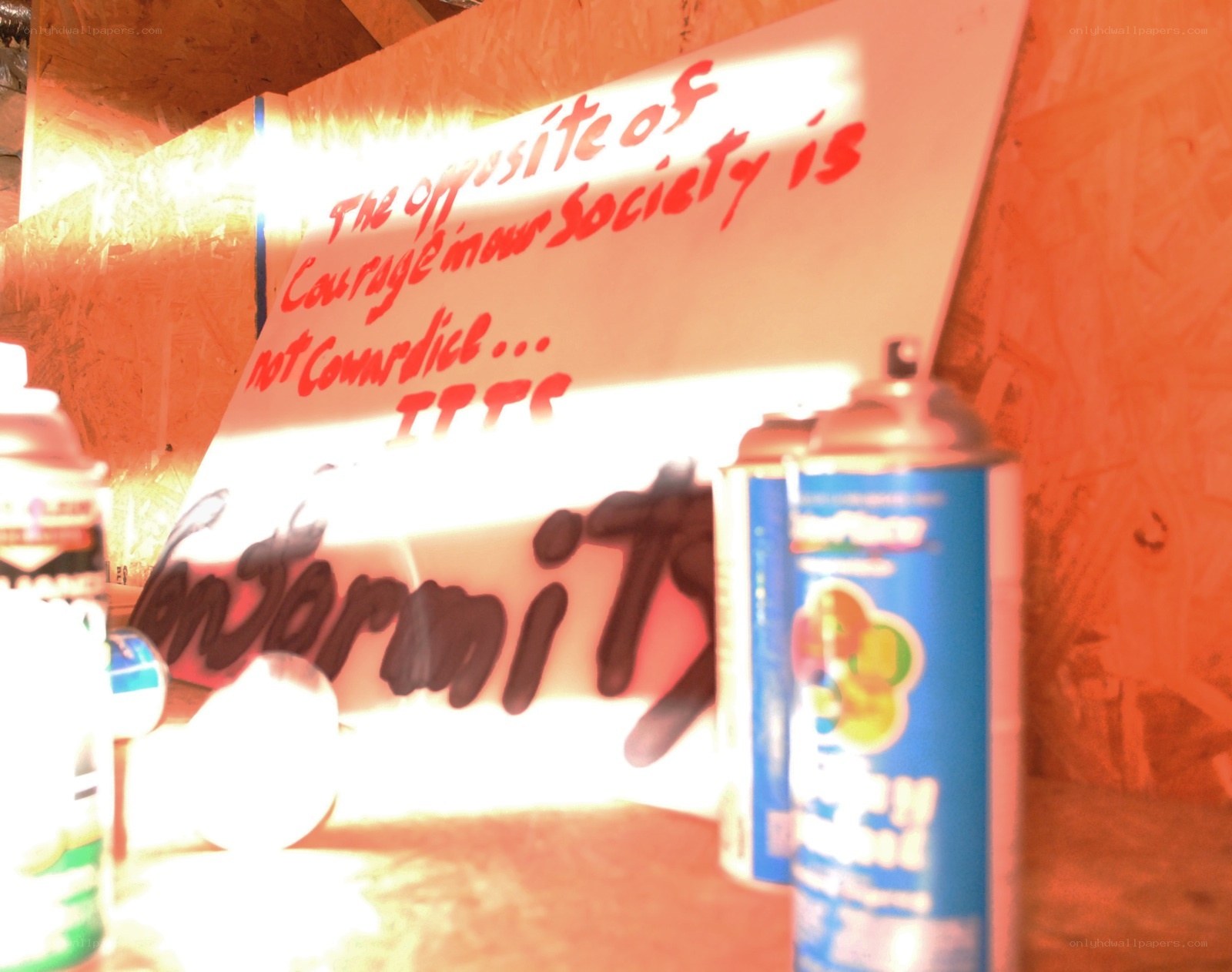 sign with spray paint cans