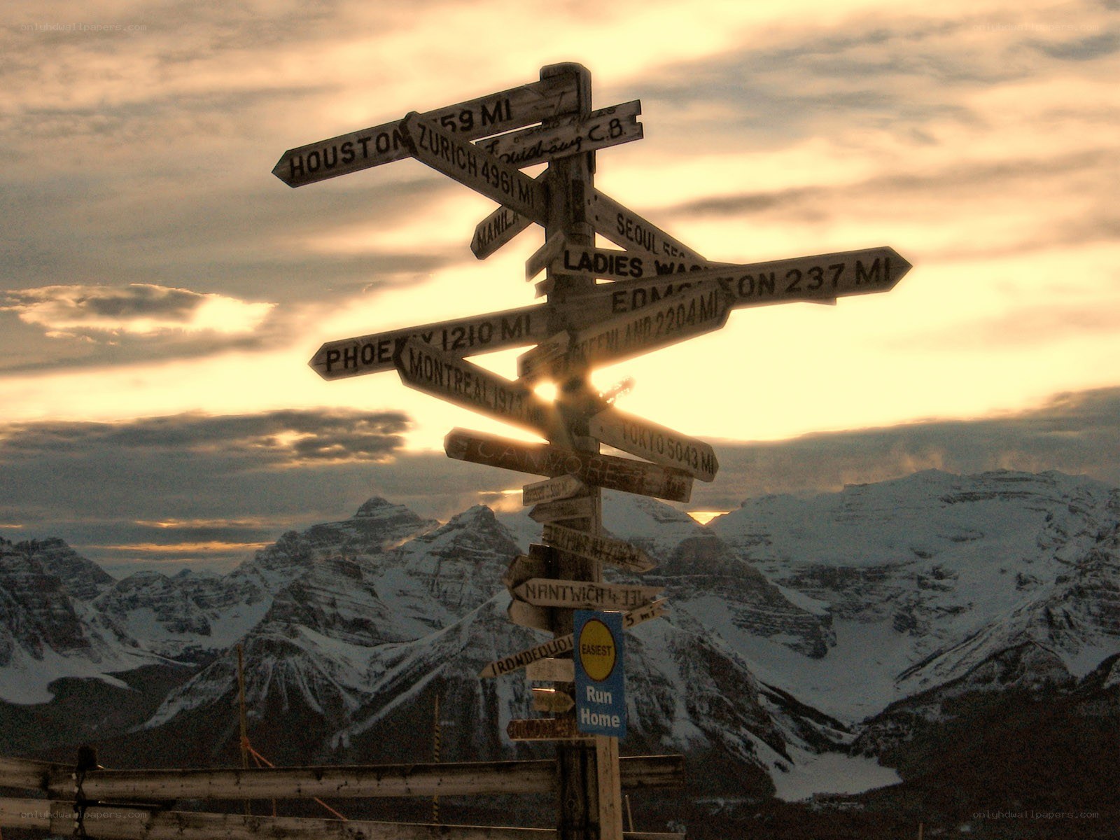 Signpost with mountain view