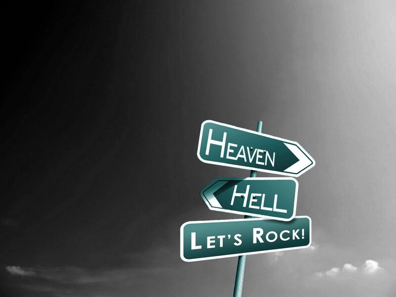 Signs pointing to heaven hell and rock