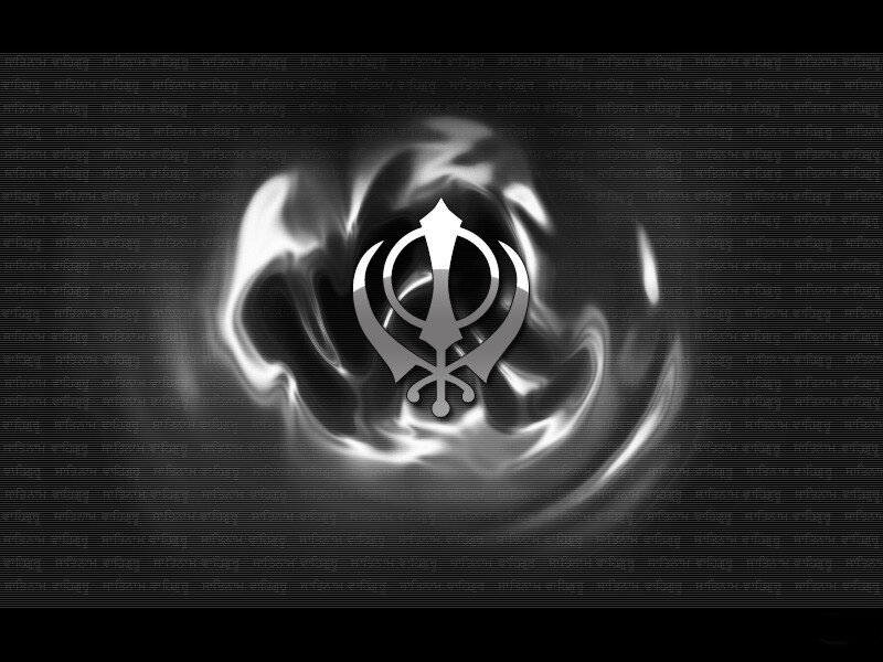 Sikh Khanda symbol on dark background