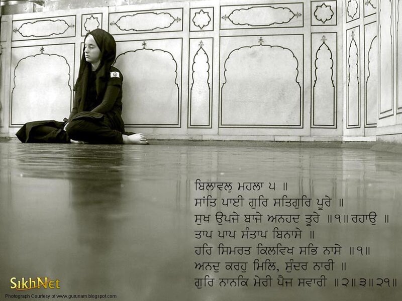Sikh woman in prayer