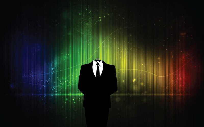 Silhouette against colorful lights