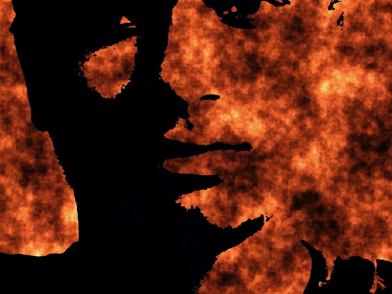 silhouette against fiery background
