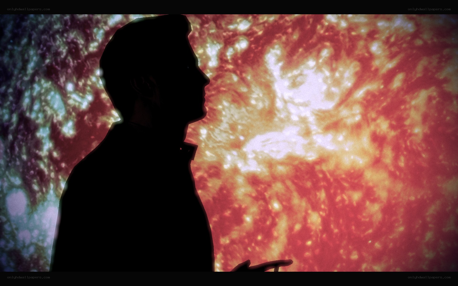 silhouette against solar display