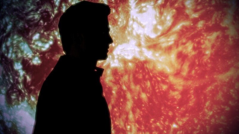silhouette against solar flare