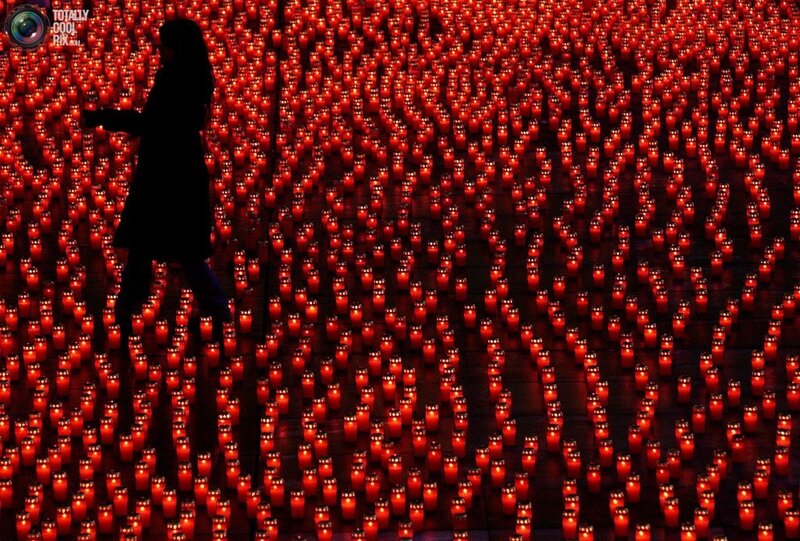 Silhouette among candles