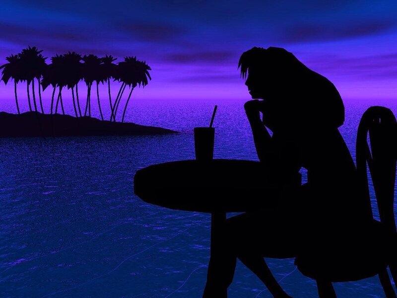 silhouette at a beachside table