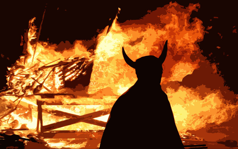 silhouette at burning pyre