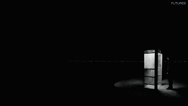 silhouette at phone booth