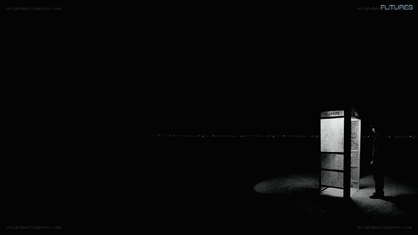 silhouette at phone booth