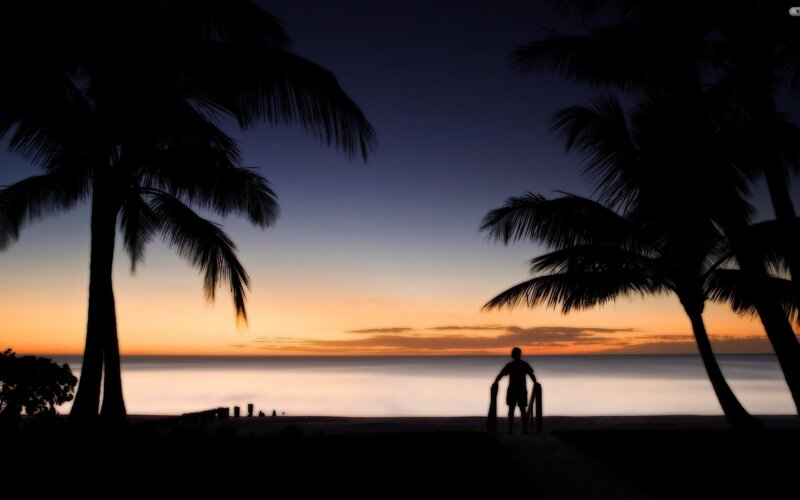 Silhouette at sunset beach