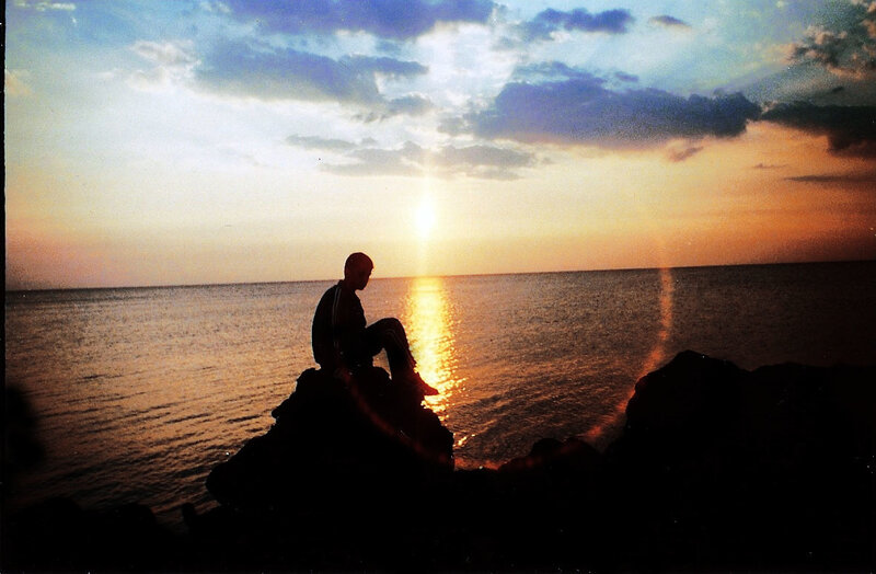 Silhouette at sunset by the sea