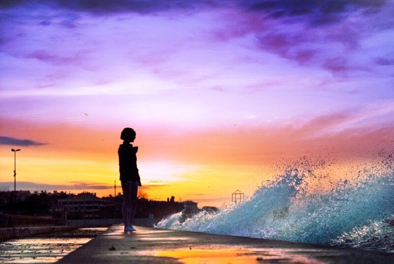 Silhouette at sunset by the sea