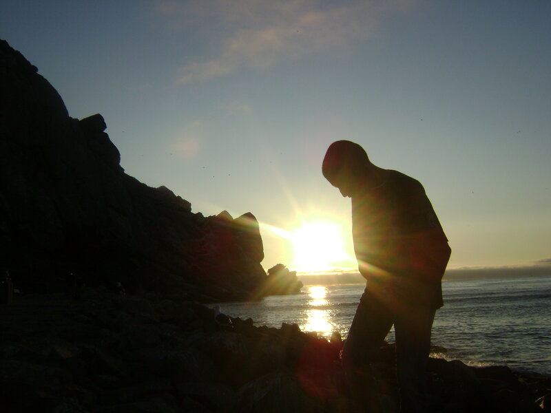 Silhouette at sunset by the sea