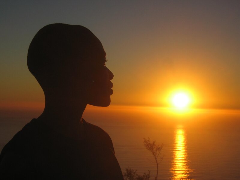 silhouette at sunset by the sea
