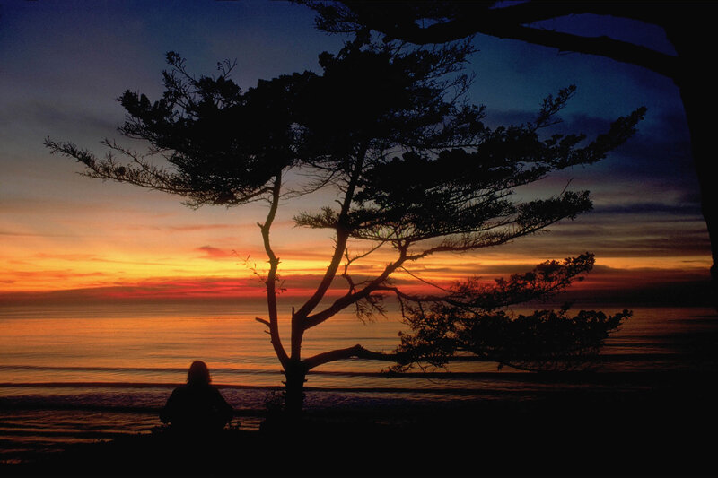 Silhouette at sunset by the sea