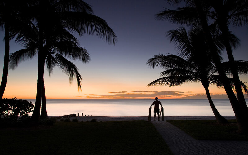 Silhouette at sunset by the sea