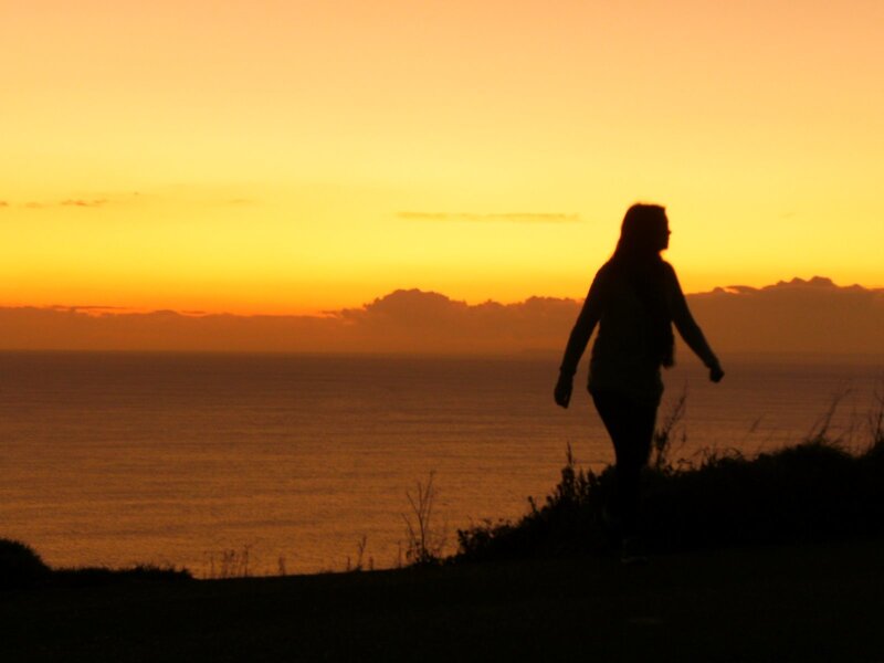 Silhouette at sunset by the sea