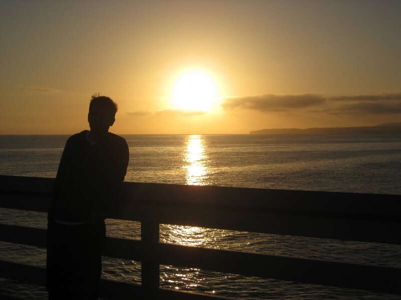 Silhouette at sunset by the sea