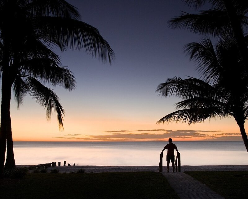 Silhouette at sunset by the sea