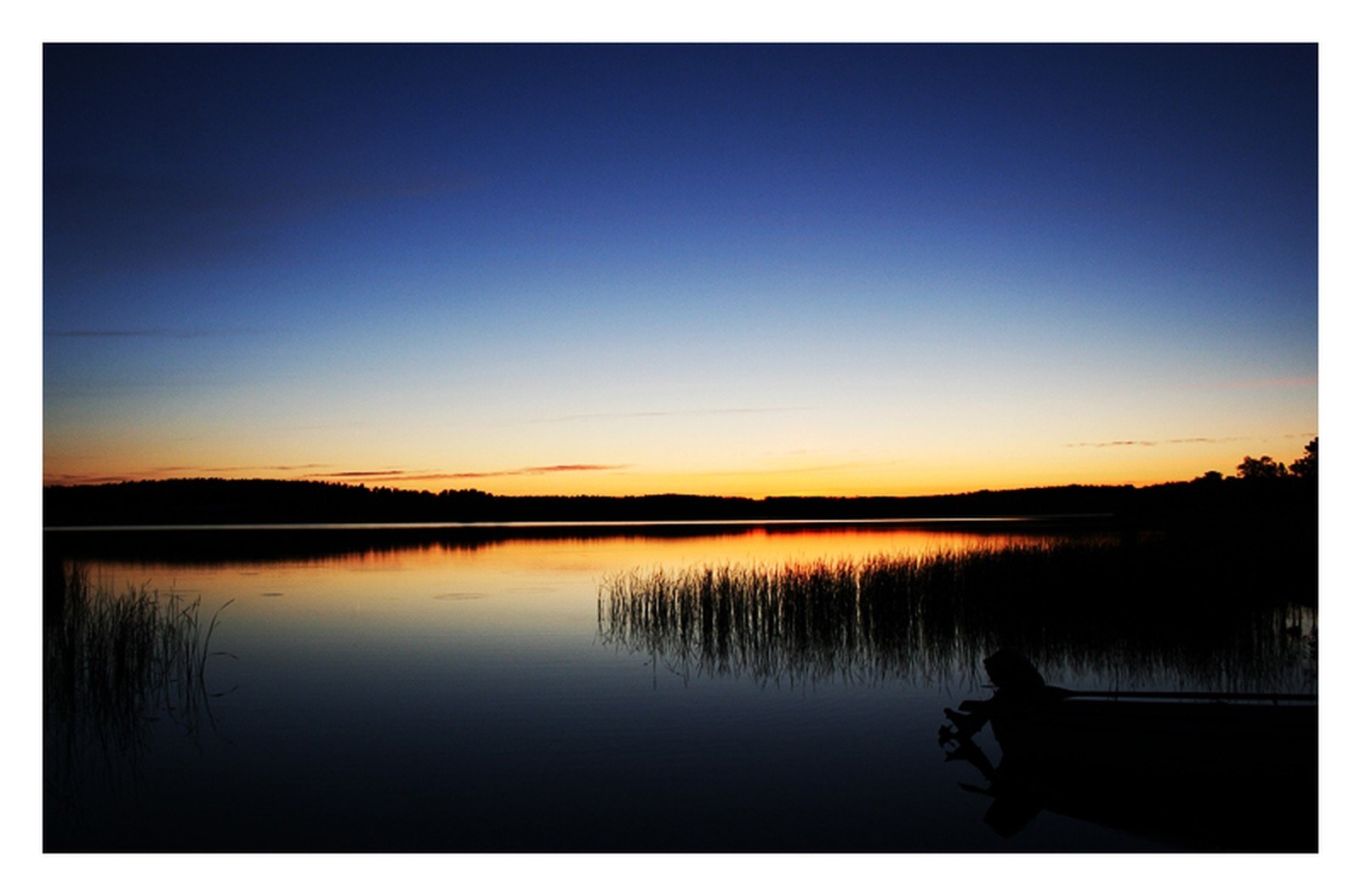 Silhouette at sunset on a lake