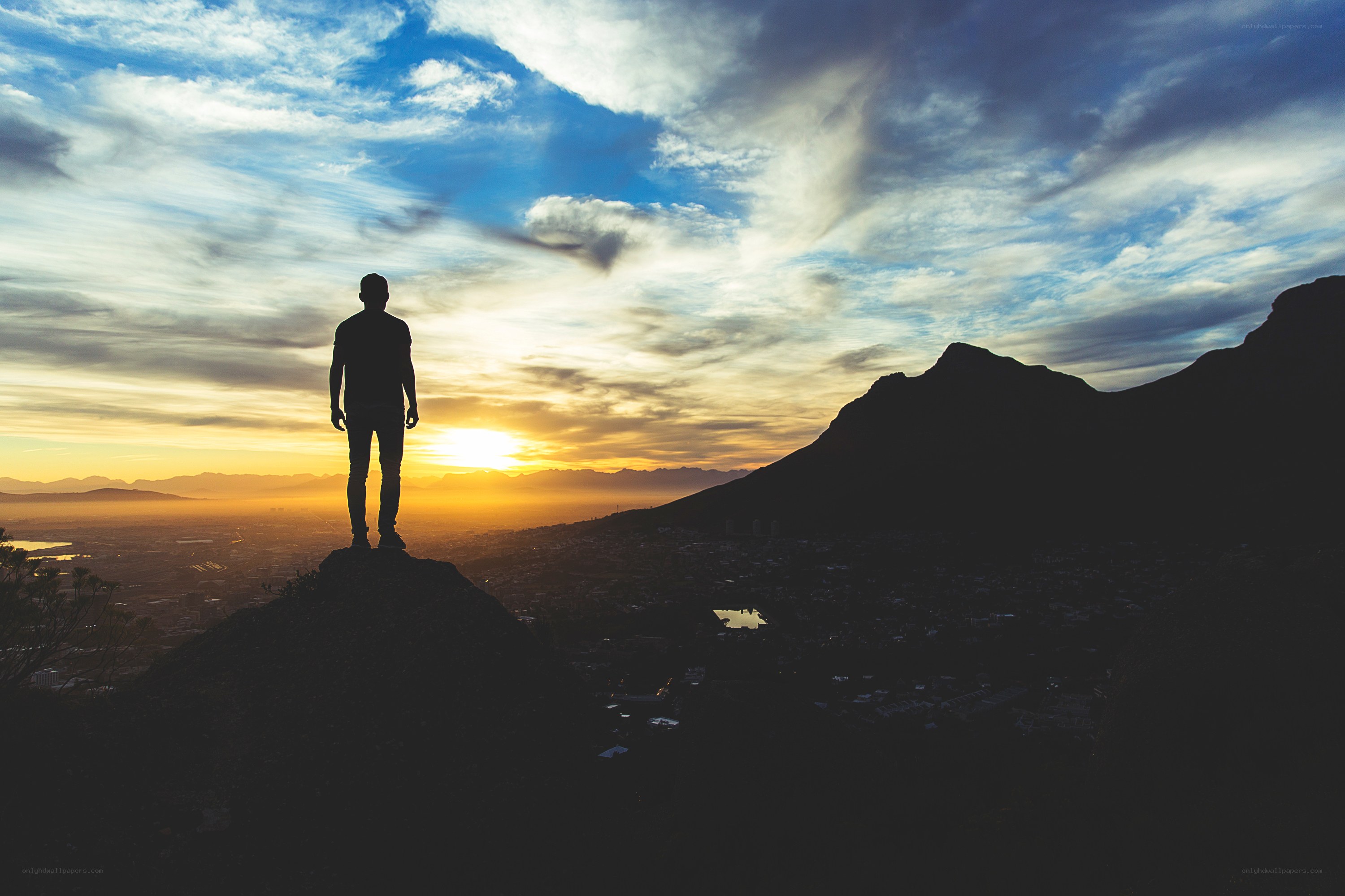 Silhouette at sunset on a mountain