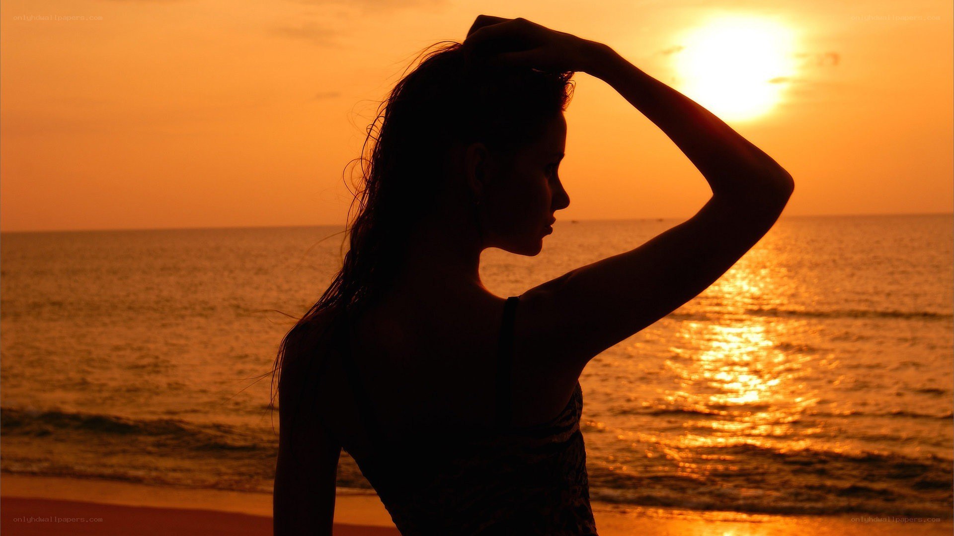 silhouette at sunset on beach