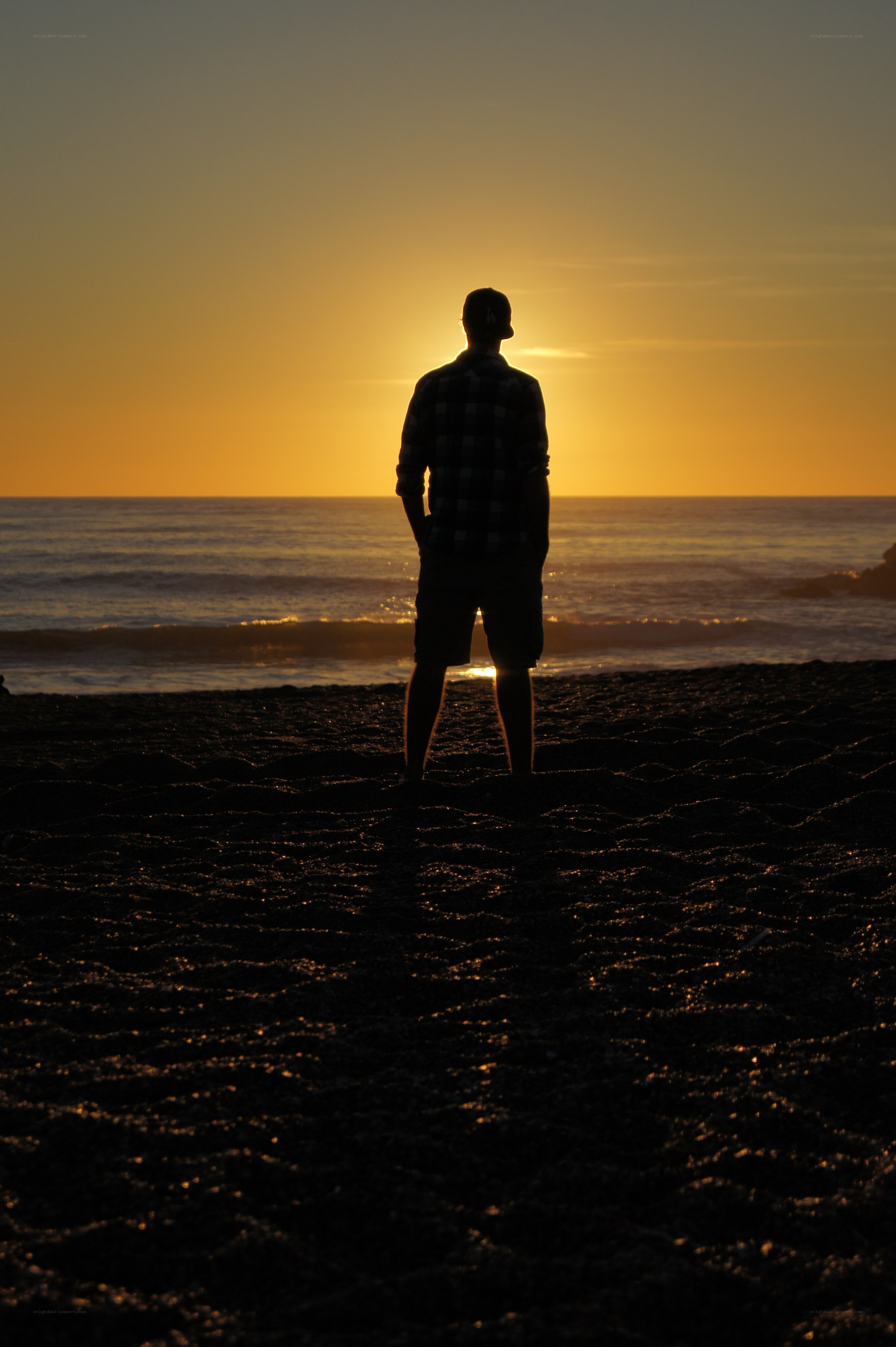 silhouette at sunset on beach