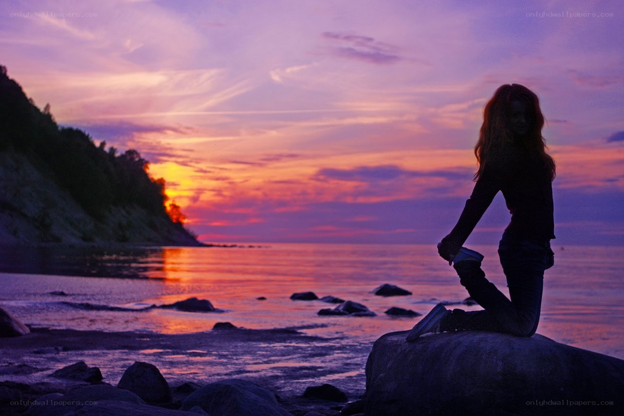 Silhouette at sunset on the shore