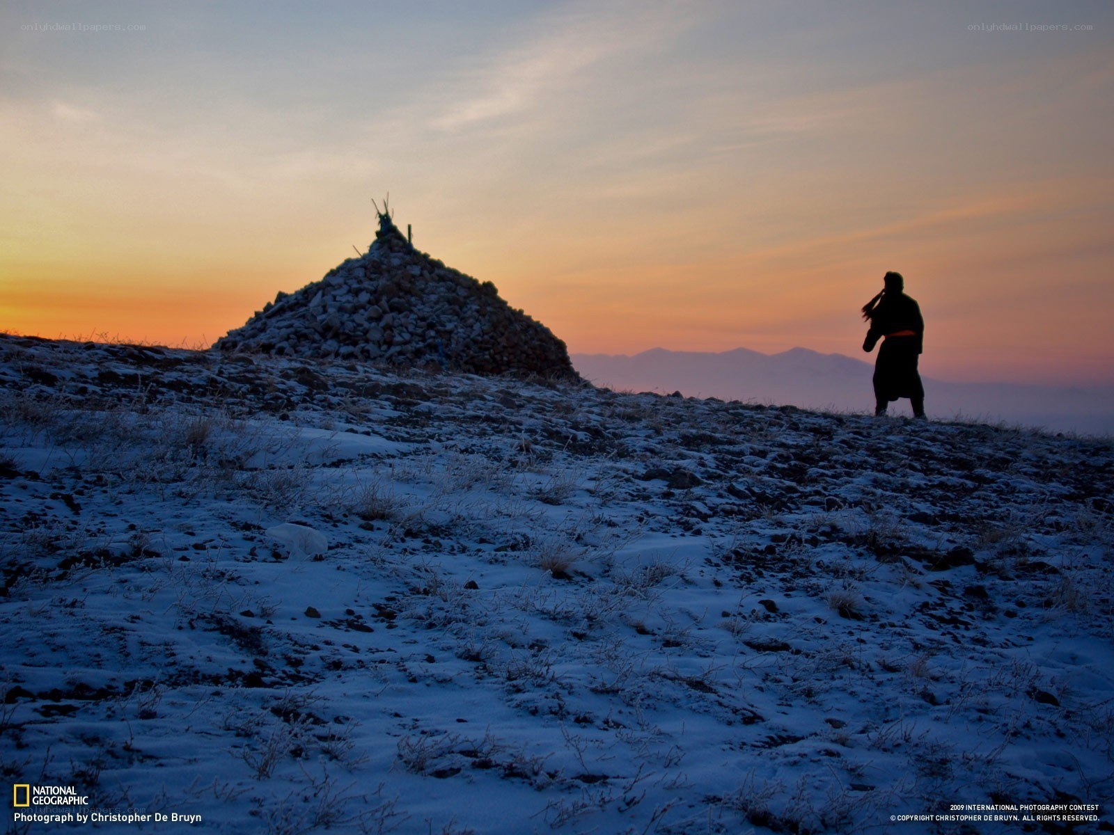 Silhouette at Sunset with Cairn