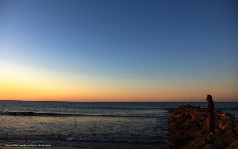 Silhouette at the seaside at dusk