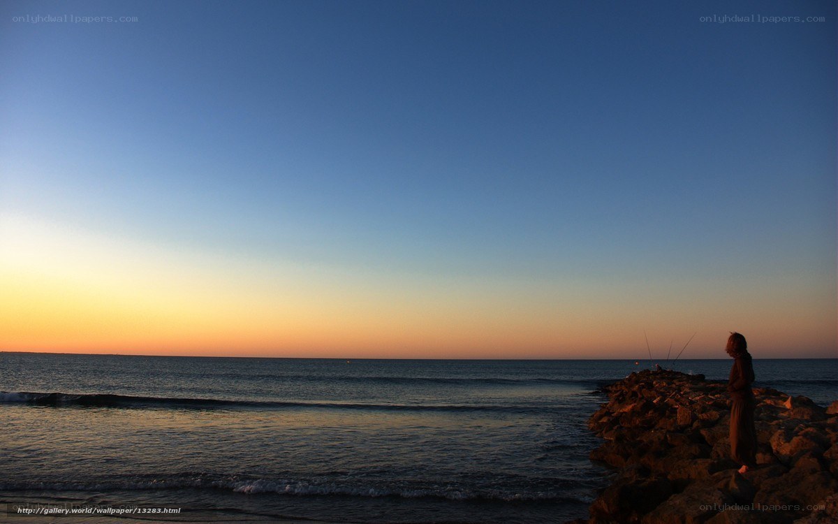 Silhouette at the seaside at dusk