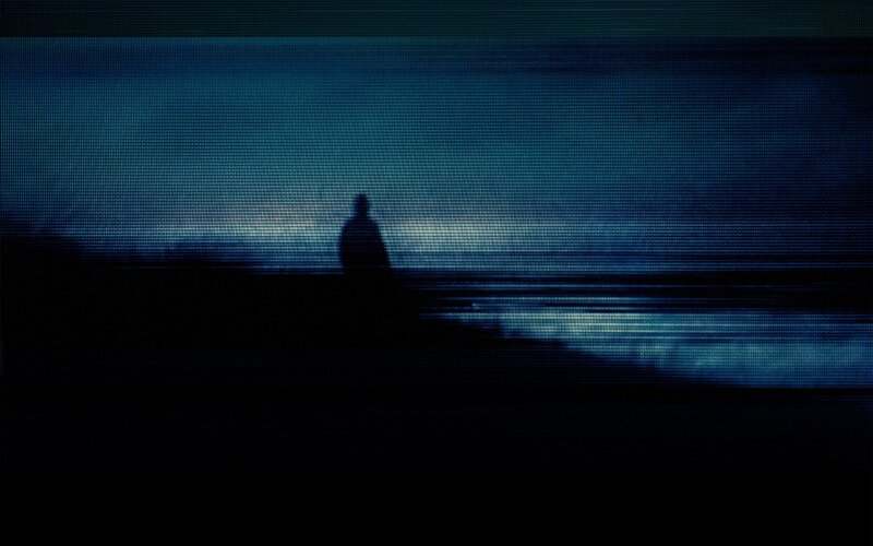 silhouette at the water's edge